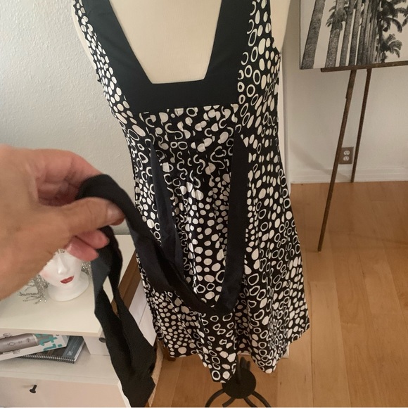 Le Lis Blanc Deux Sleeveless mini dress; black background with cream polka dots - Picture 9 of 9